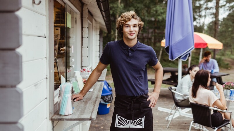 Young man in apron
