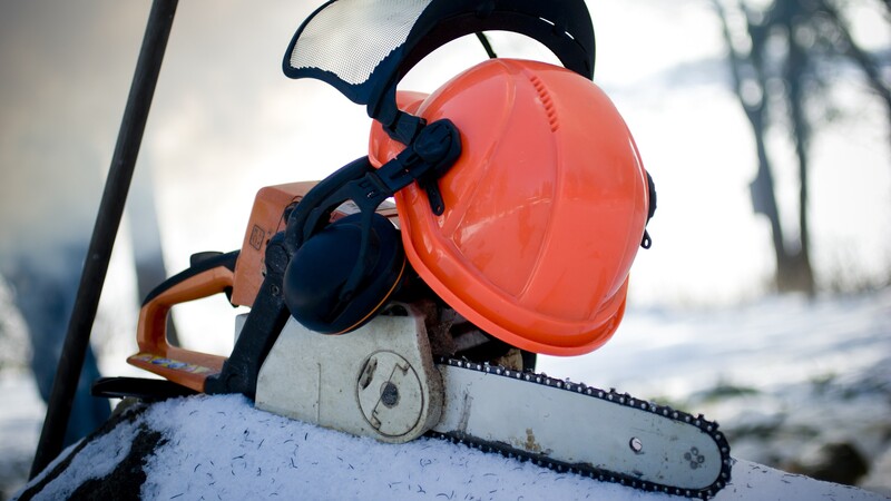 Safety helmet on a chainsaw